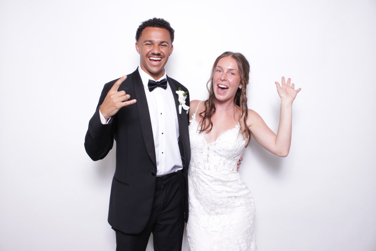 A couple at a Bloom Booth wedding