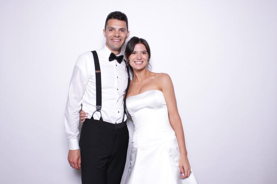 Bride and groom at a wedding photo booth
